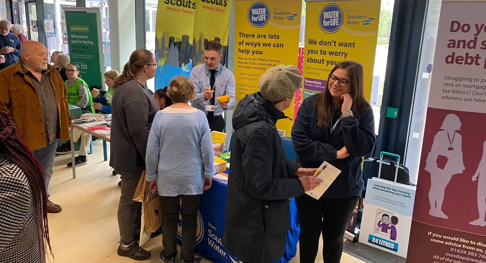 Employees talking to the public at a fayre about southern water