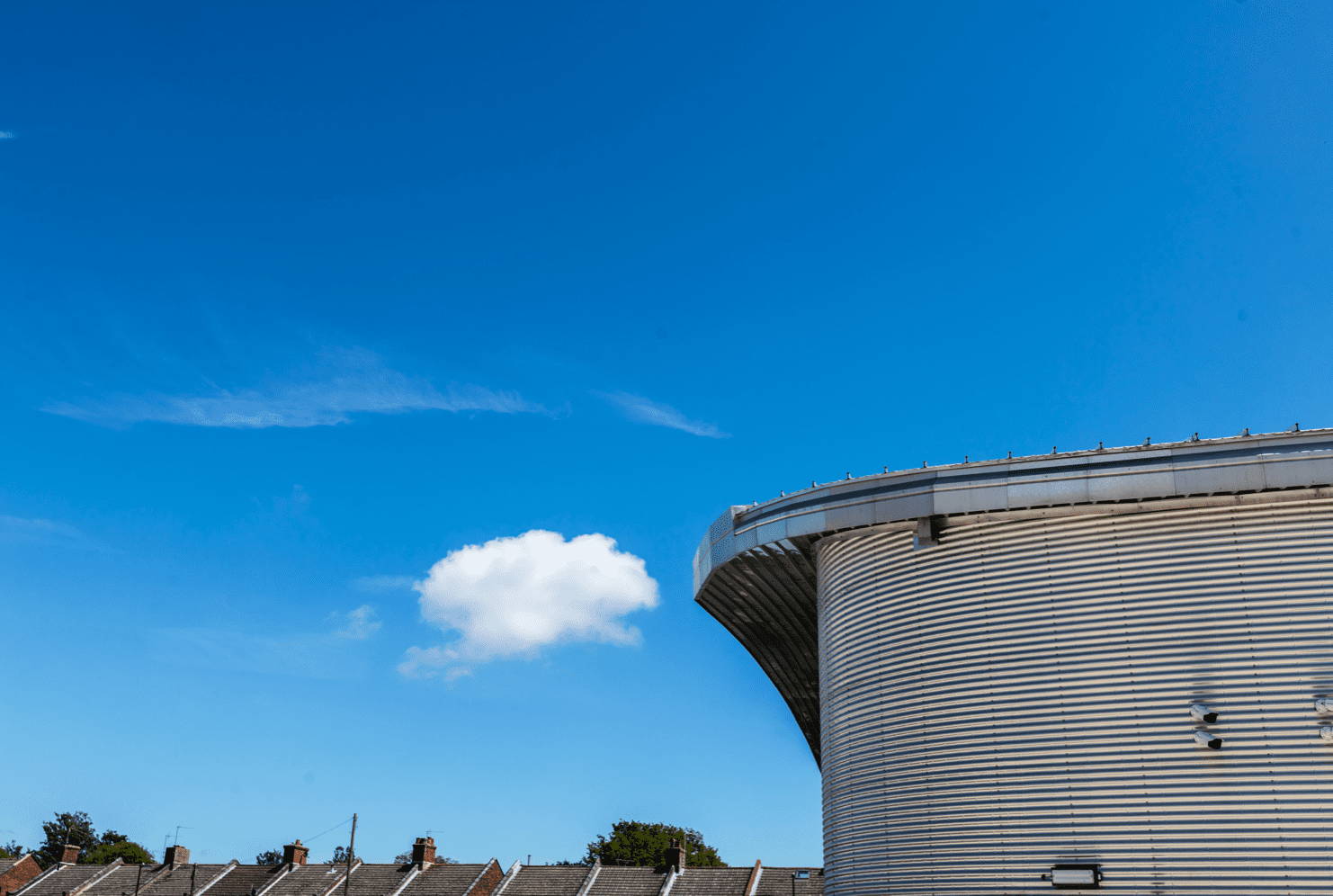 A low angle shot of a building with a blue sky in the background