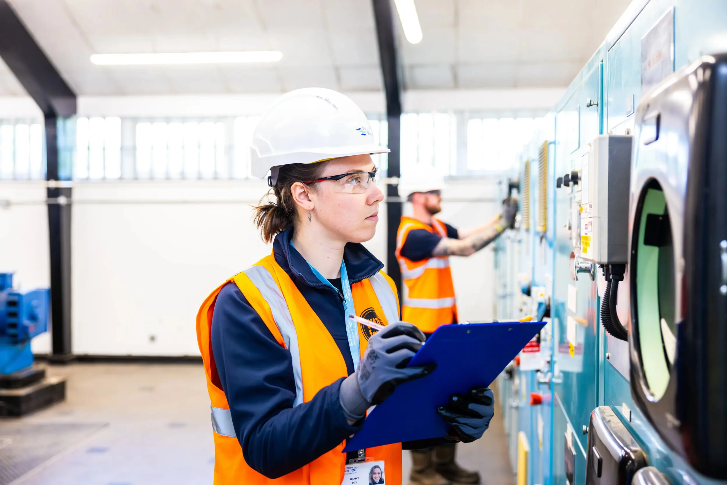 Lady monitoring at a wastewater treatment site