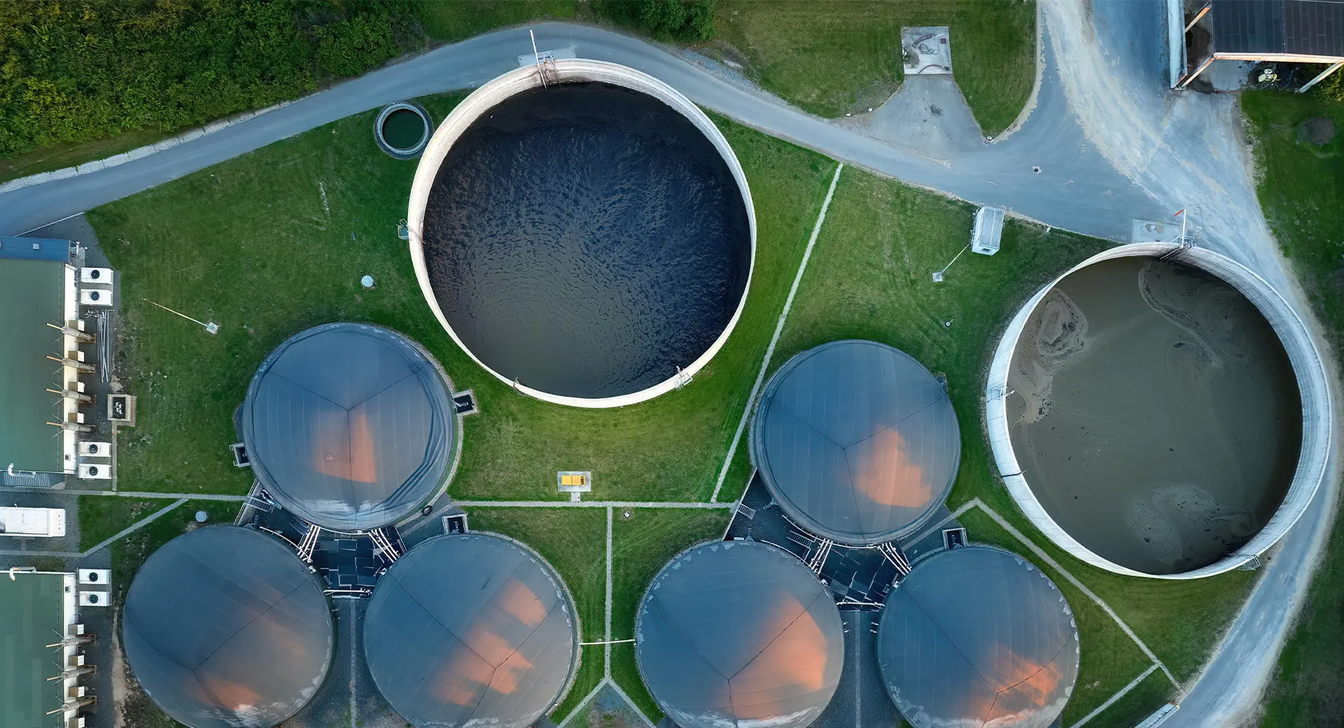 An aerial high angled shot of a water treatment facility