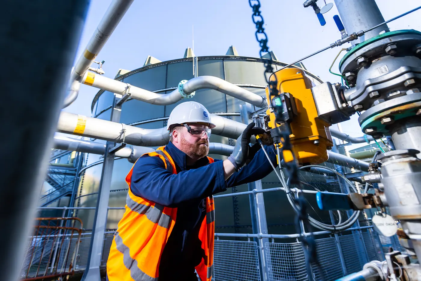 A Southern Water engineer inspects a control valve at a wastewater treatment works