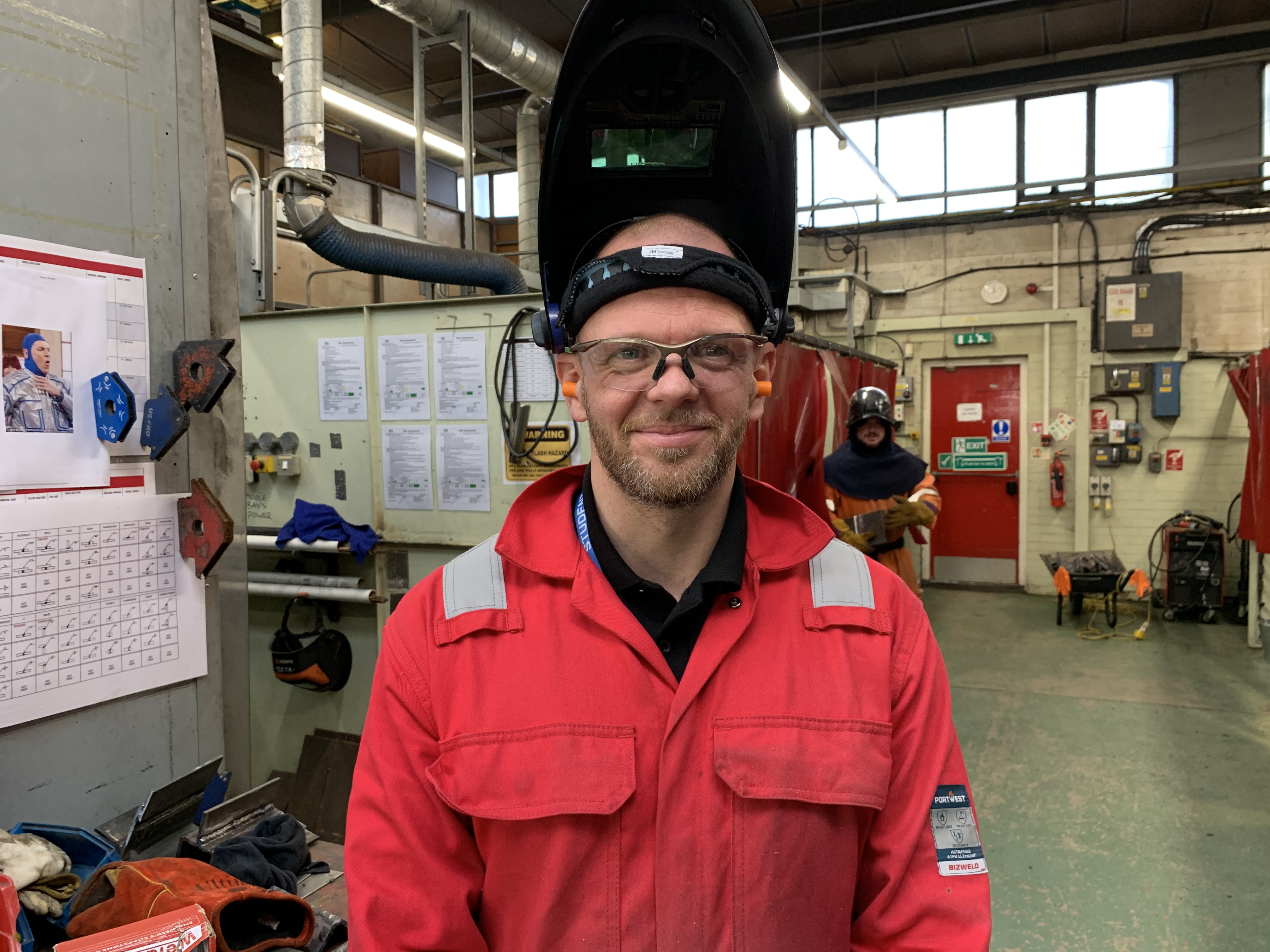 Image of an apprentice at work 
                        