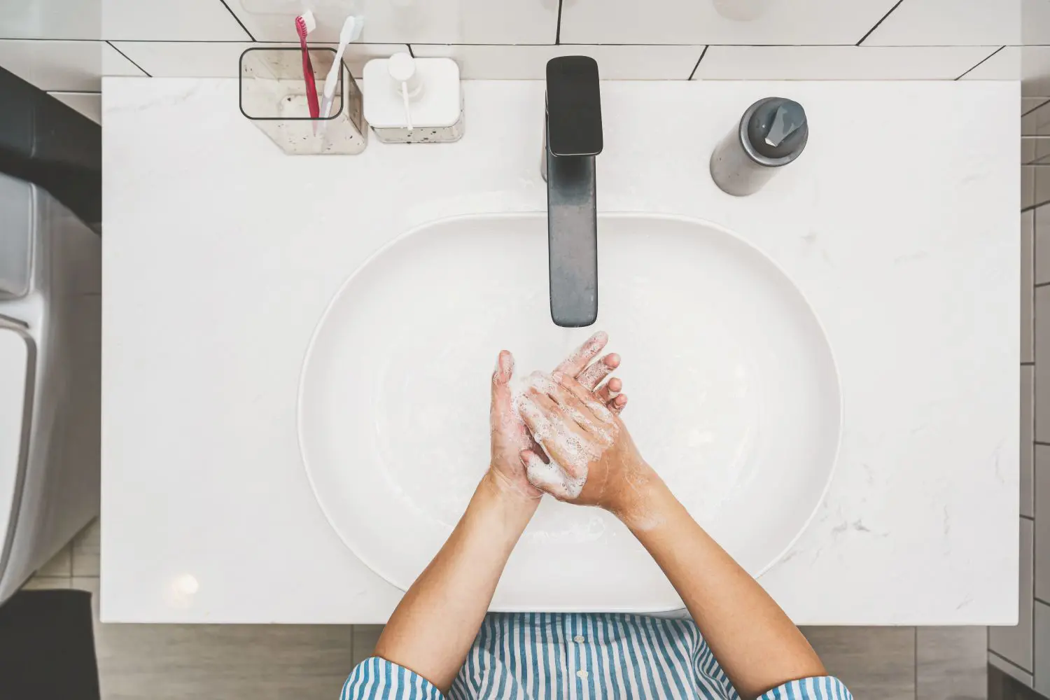 Office sink washing hands