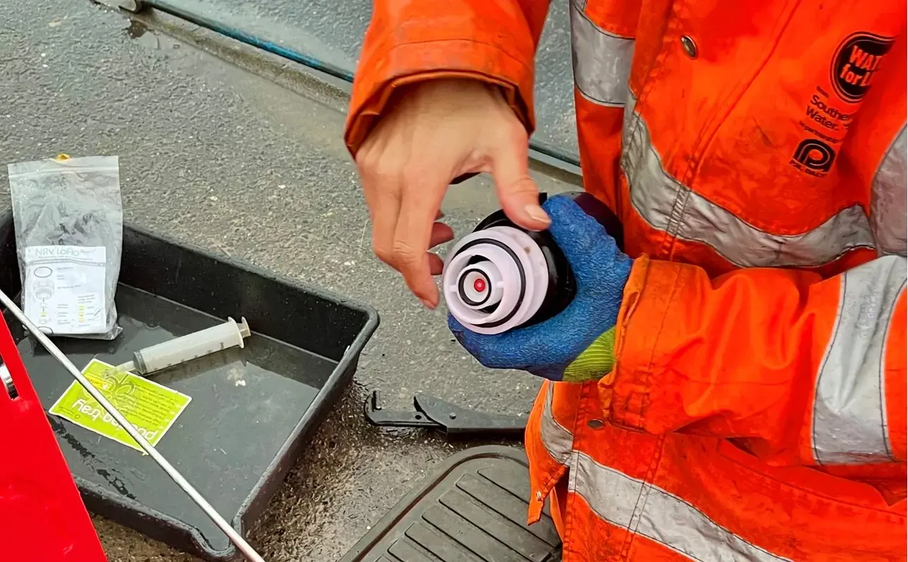 Flow regulator being fitted