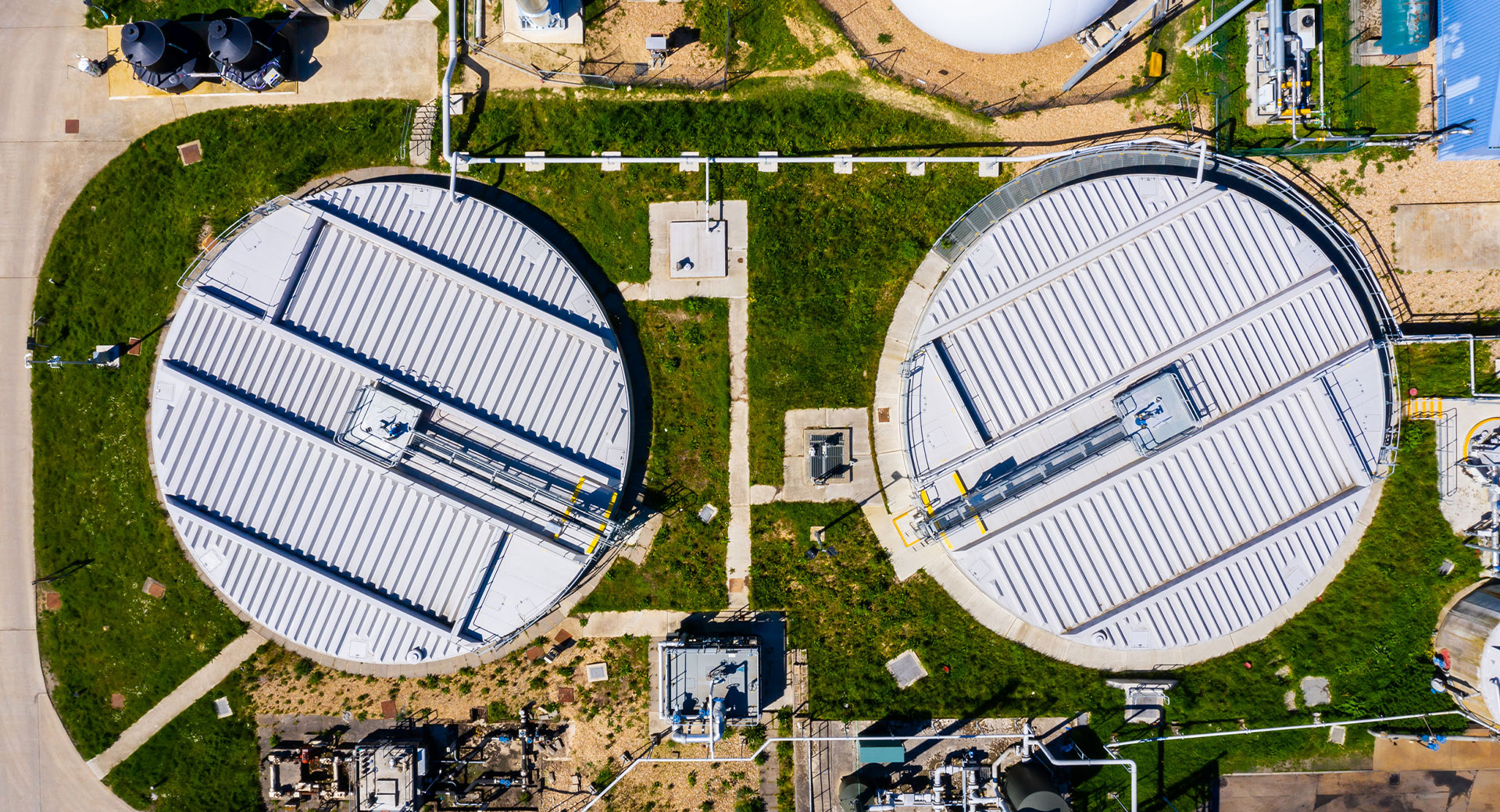 An aerial view of tanks at a wastewater treatment works
