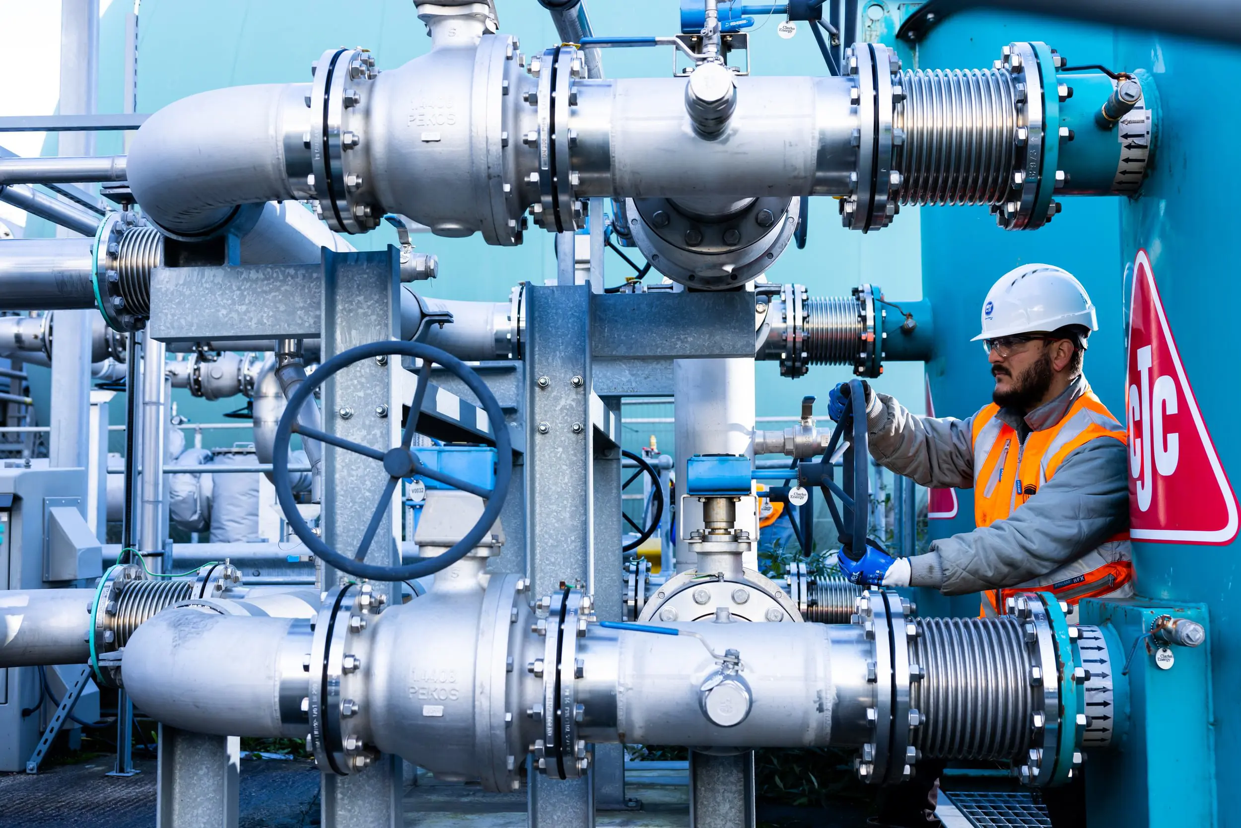 Man surrounded by pipes at a Southern Water site