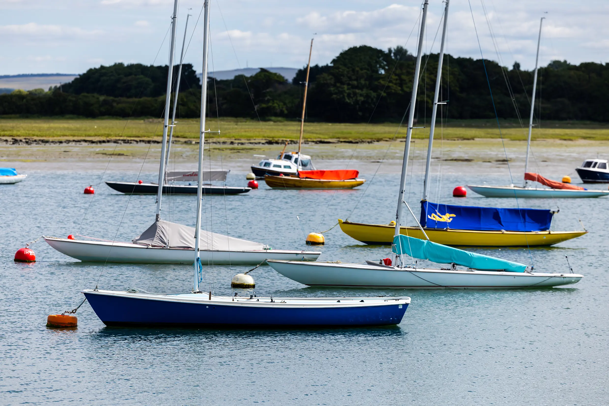 Sailing boats moored at Chichester Harbour