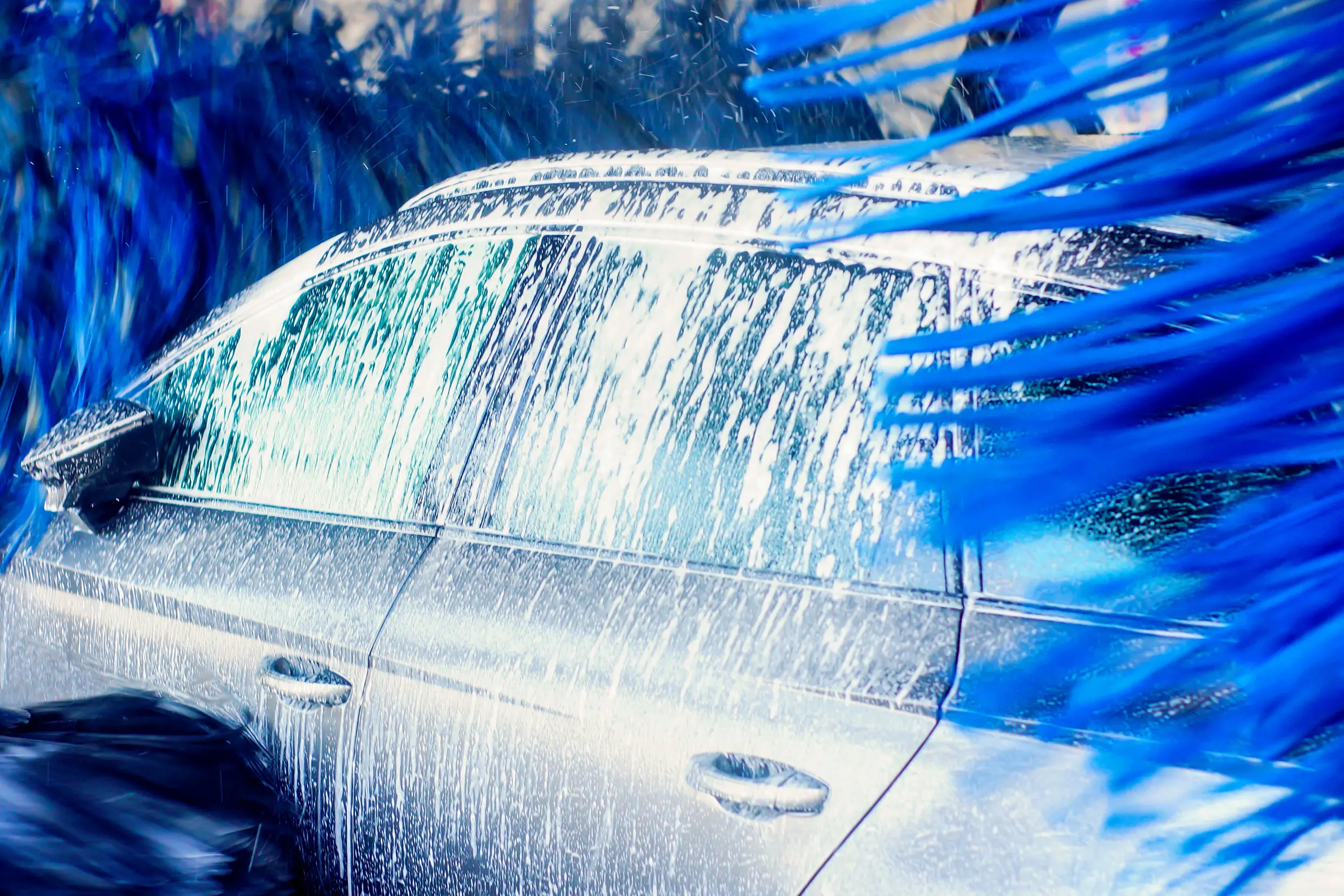 Car being washed by an automatic car wash
